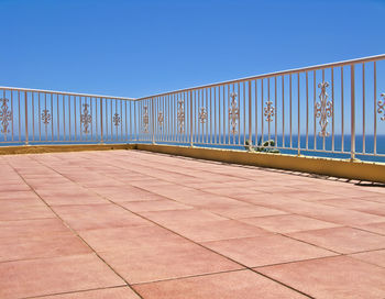 Scenic view of beach against clear sky