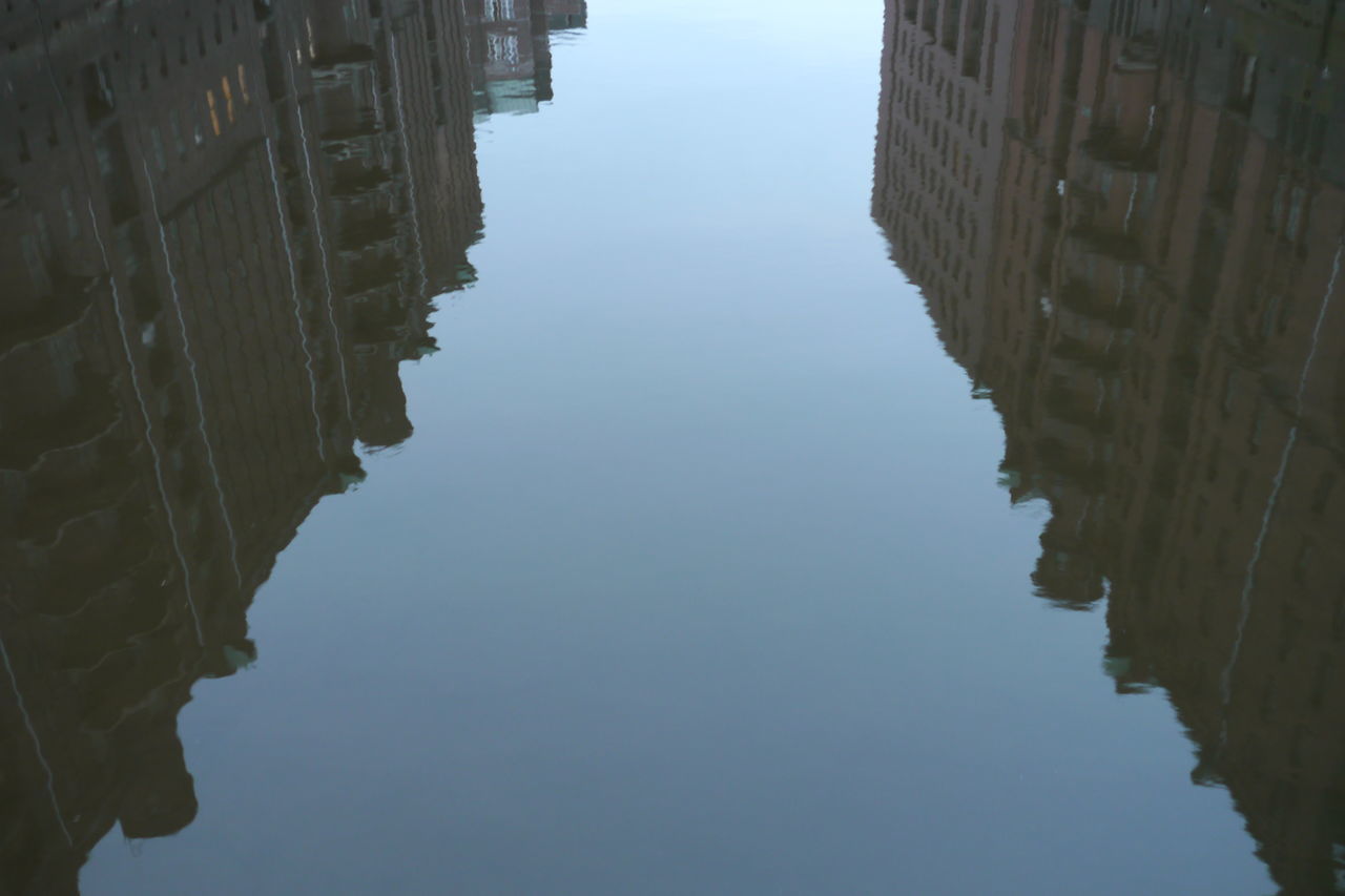 REFLECTION OF BUILDING IN WATER