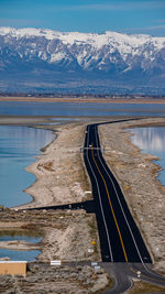 Cropped image of man standing at beach