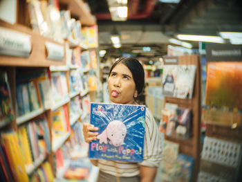 Portrait of woman standing in store