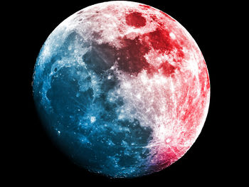 Close-up of moon over black background
