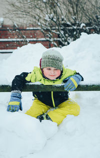 Boy wearing hat in snow