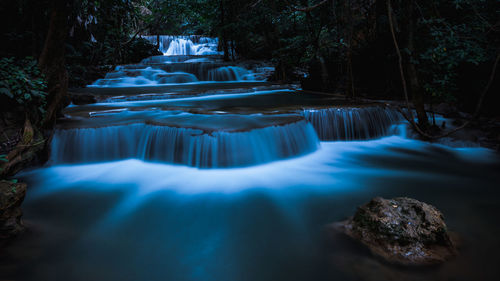 Long exposure waterfall in the park at night huai mae khamin waterfall kanchanaburi thailand