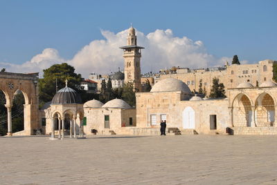 Dome of the rock in city against sky