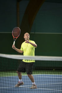 Man playing tennis