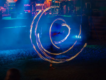 Light trails in sea at night