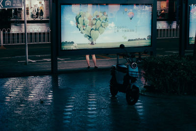 Person with toy on street in city