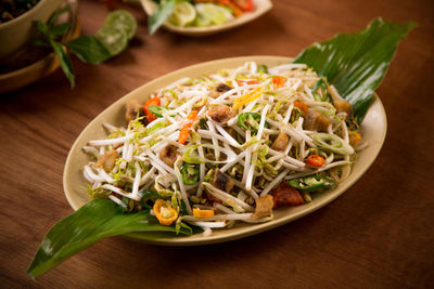 High angle view of salad in plate on table