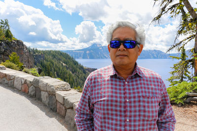 Portrait of man standing outdoors