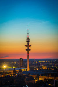 View of communication tower during sunset