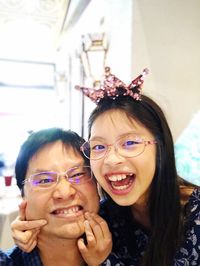 Portrait of happy mother with daughter