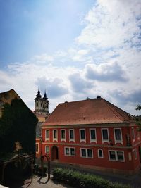 Building against cloudy sky