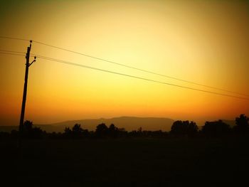 Silhouette of trees at sunset