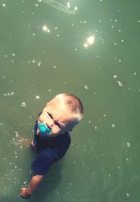 Boy in swimming pool