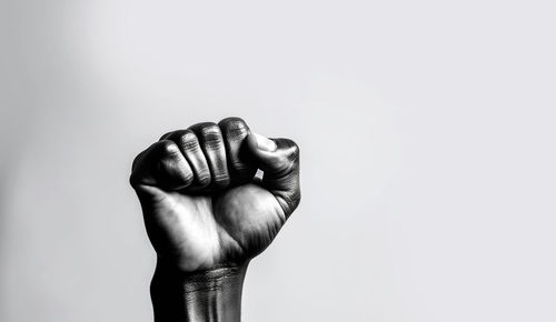 Low angle view of statue against white background