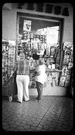 Full length of woman standing in city