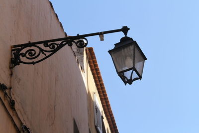 Low angle view of built structure against blue sky