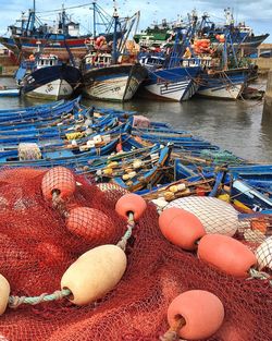 High angle view of fishing nets and buoys