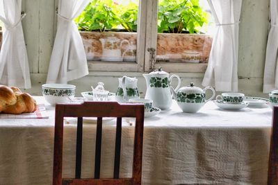 Chairs and tables in glass window