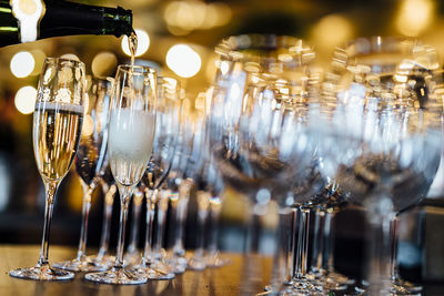 Pouring and serving champagne in a luxury social events like weddings and party.