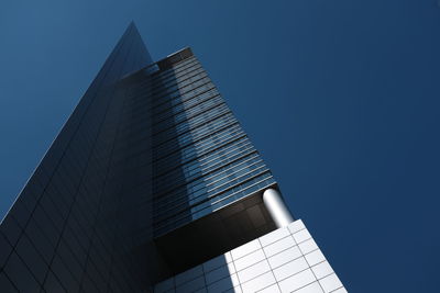 Low angle view of modern building against sky