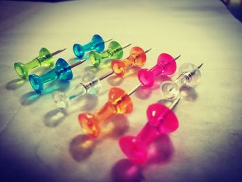 Close-up of multi colored candies on table