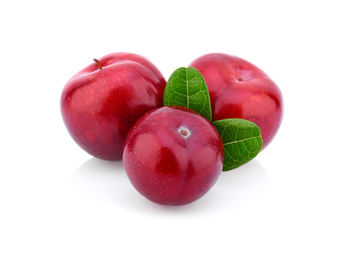 Close-up of apple against white background