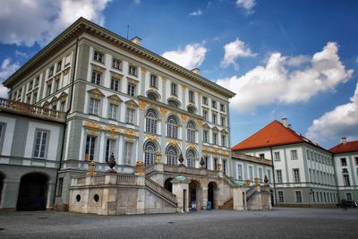 View of old building against cloudy sky