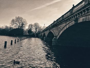 Bridge over river against sky