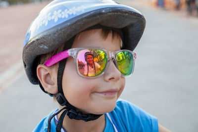 Portrait of young woman wearing sunglasses