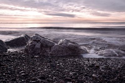 Scenic view of sea against sky during sunset