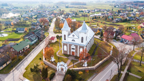 High angle view of road amidst buildings in town