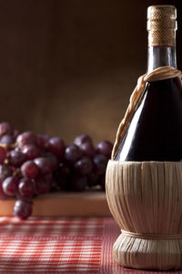 Close-up of grapes on table