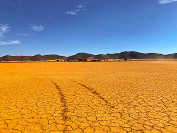 Scenic view of desert against sky