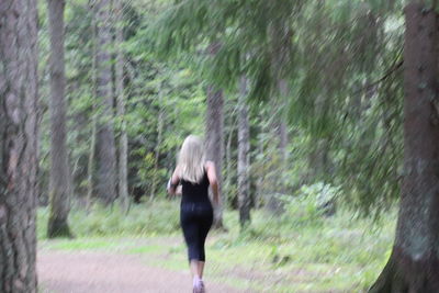 Man standing in forest