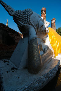 Close-up of statue against sky