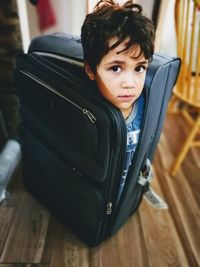 Close-up of boy sitting