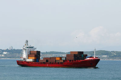 View of container ship in sea