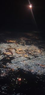 Aerial view of illuminated moon at night