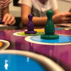 Close-up of chess playing on table