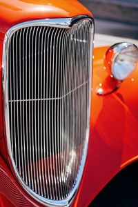 Close-up of orange vintage car