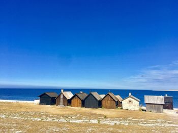 View of beach against blue sky