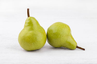 Close-up of fruits against white background