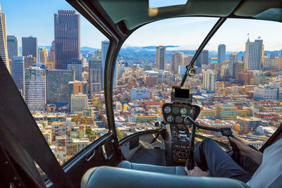 Cityscape seen through glass window