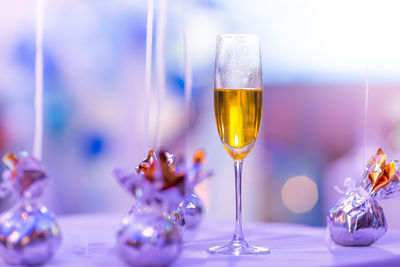 Close-up of wine glass on table