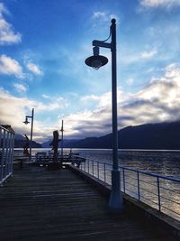 Pier over sea against sky