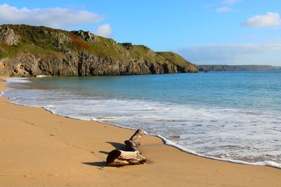 Scenic view of beach against sky