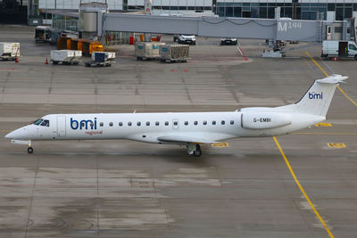 High angle view of airplane on airport runway