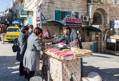 People on street in city