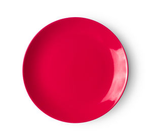 Close-up of red balloon against white background